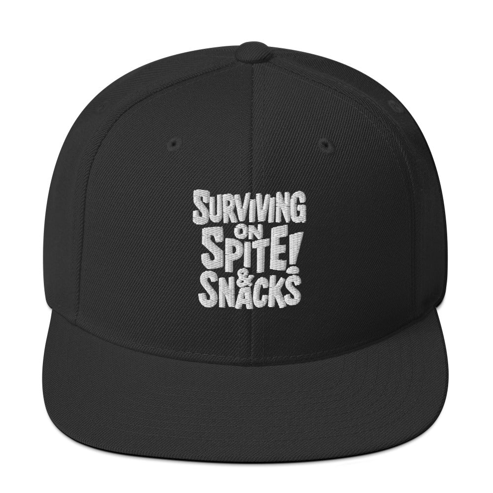 Surviving on Spite & Snacks sarcastic hat - snapback black, front view