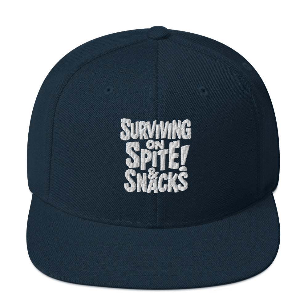 Surviving on Spite & Snacks sarcastic hat - snapback dark navy, front view