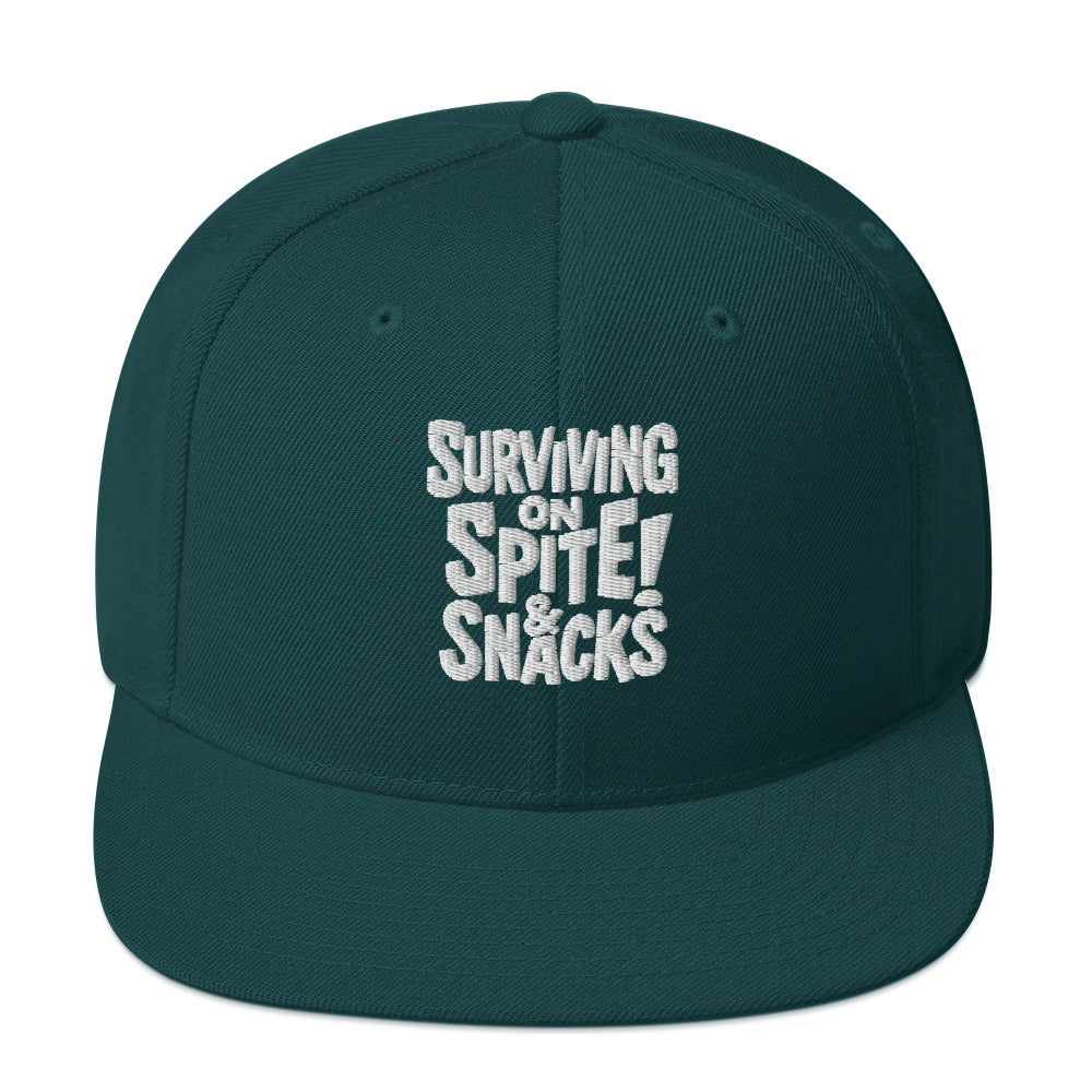 Surviving on Spite & Snacks sarcastic hat - snapback spruce, front view